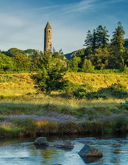 Round tower and monastic ruins at Glendalough in County Wicklow